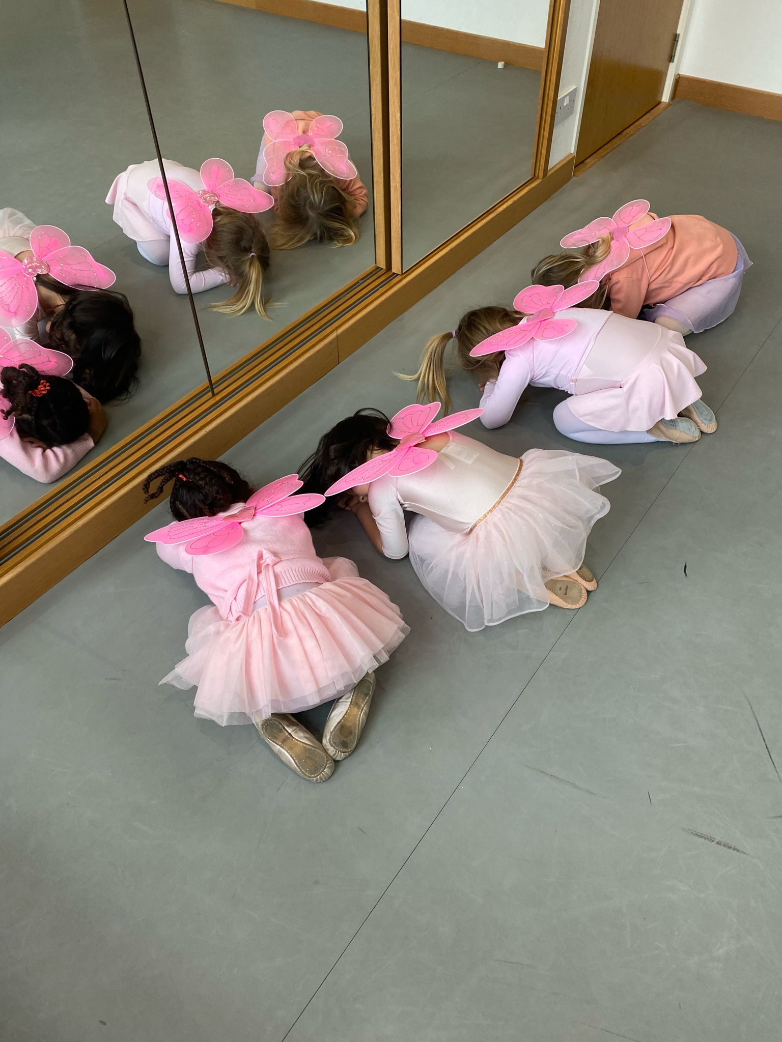 Butterfly-themed floorwork in class